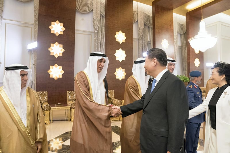 ABU DHABI, UNITED ARAB EMIRATES - July 19, 2018: HE Jaber Al Suwaidi, General Director of the Crown Prince Court - Abu Dhabi (2nd L) greets HE Xi Jinping, President of China (3rd L), during a reception held at the Presidential Airport. Seen with HE Ali Obaid Ali Al Dhaheri, UAE Ambassador to China (L), and Peng Liyuan, First Lady of China (R).

( Mohamed Al Hammadi / Crown Prince Court - Abu Dhabi )
---