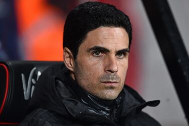 (FILES) In this file photo taken on January 27, 2020 Arsenal's Spanish head coach Mikel Arteta awaits kick off in the English FA Cup fourth round football match between Bournemouth and Arsenal at the Vitality Stadium in Bournemouth, southern England. Arsenal manager Mikel Arteta has tested positive for the coronavirus, the Premier League club announced on March 12, 2020. "Our London Colney training centre has been closed after head coach Mikel Arteta received a positive Covid-19 result this evening," the Arsenal statement read. - RESTRICTED TO EDITORIAL USE. No use with unauthorized audio, video, data, fixture lists, club/league logos or 'live' services. Online in-match use limited to 120 images. An additional 40 images may be used in extra time. No video emulation. Social media in-match use limited to 120 images. An additional 40 images may be used in extra time. No use in betting publications, games or single club/league/player publications. / AFP / Glyn KIRK / RESTRICTED TO EDITORIAL USE. No use with unauthorized audio, video, data, fixture lists, club/league logos or 'live' services. Online in-match use limited to 120 images. An additional 40 images may be used in extra time. No video emulation. Social media in-match use limited to 120 images. An additional 40 images may be used in extra time. No use in betting publications, games or single club/league/player publications.