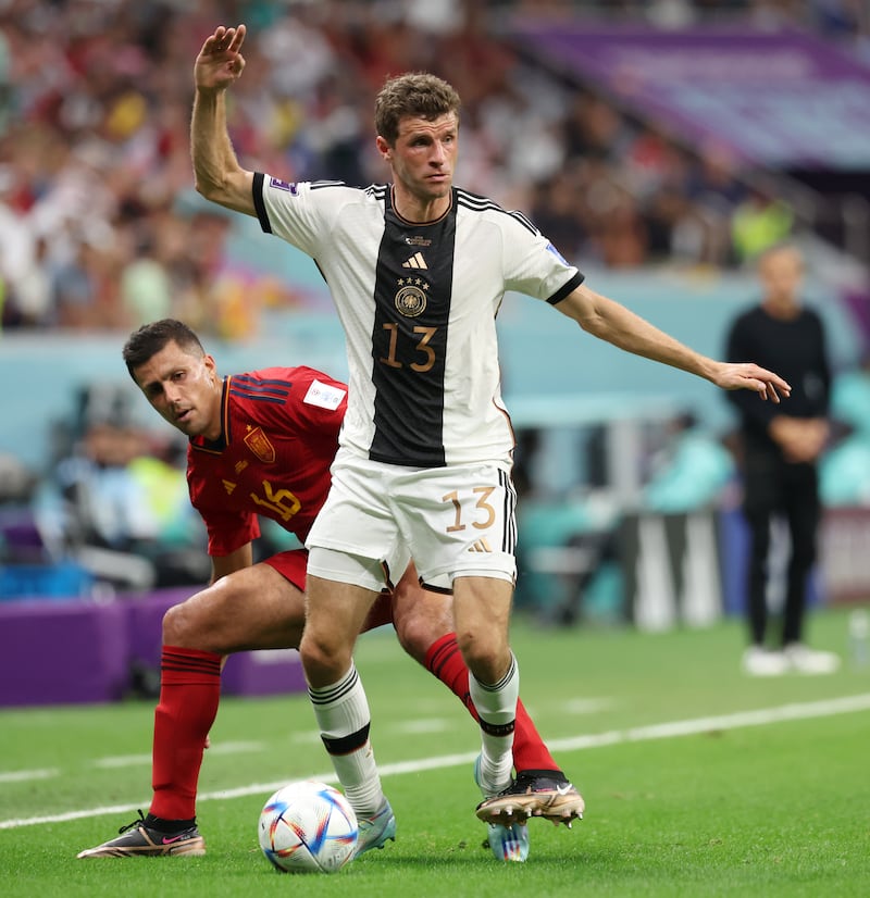 Germany's Thomas Muller controls the ball under pressure from Rodri. Getty