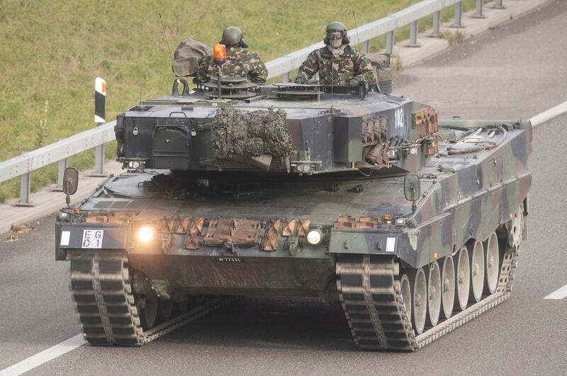 Swiss soldiers are seen in a Leopard 2 tank. The workhorse of many European armies has been long sought by Kyiv in its war with Russia. Reuters