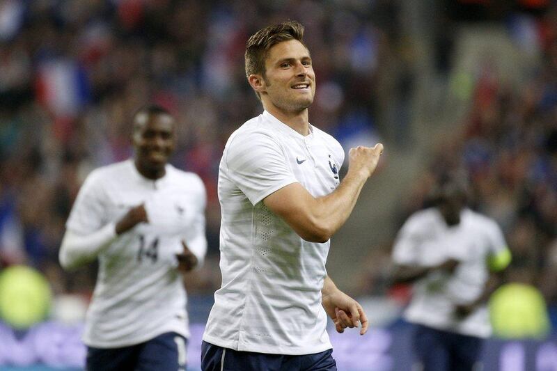 Olivier Giroud of France celebrates after scoring to give France a 2-0 lead against Norway in an international friendly on Tuesday. Yoan Valat / EPA / May 27, 2014  