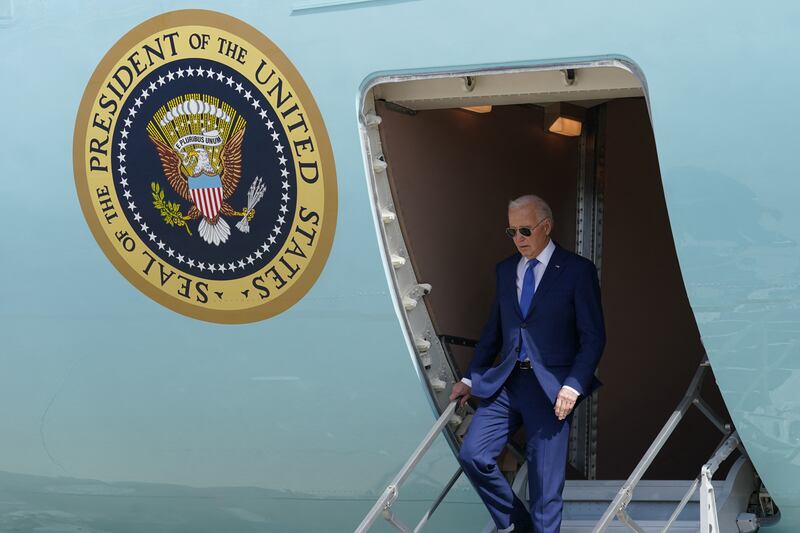 US President Joe Biden steps down from Air Force One in Chicago, Illinois. Reuters