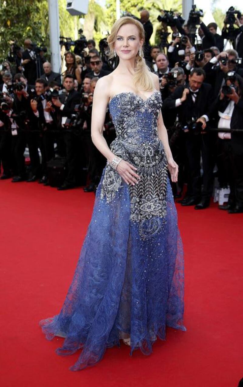 Cast member Nicole Kidman poses on the red carpet as she arrives for the opening ceremony and the screening of the film. Eric Gaillard / Reuters