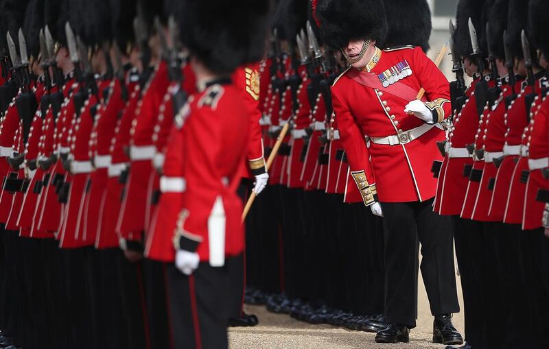 Members of the Coldstream Guards prepare ahead of a ceremonial welcome for King Willem-Alexander and Queen Maxima of the Netherlands, on Horse Guards Parade in London, UK. AFP