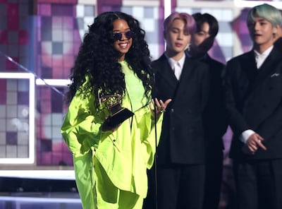 H.E.R. accepts the award for best R&B album for "H.E.R." at the 61st annual Grammy Awards on Sunday, Feb. 10, 2019, in Los Angeles. (Photo by Matt Sayles/Invision/AP)