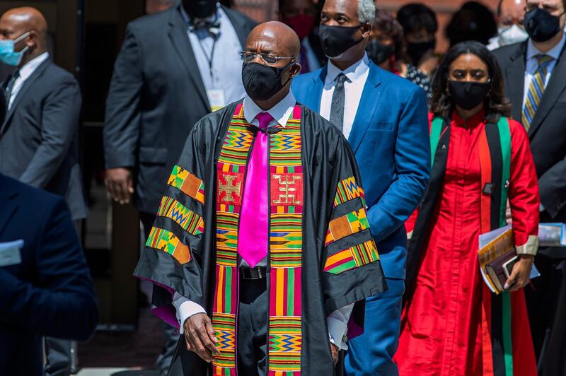 Rev Raphael Warnock walks during the funeral for Rayshard Brooks.  EPA