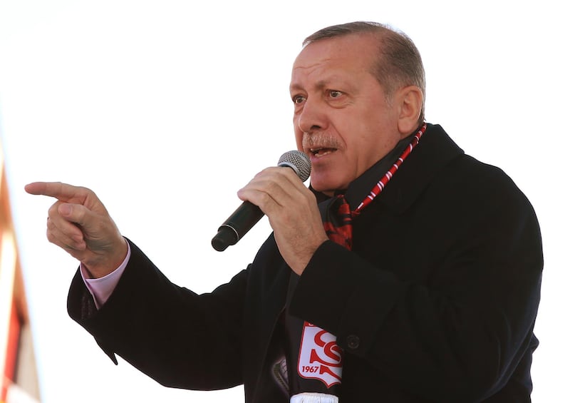 Turkey's President Recep Tayyip Erdogan, gestures as he delivers a speech at his ruling political party's conference in Sivas, central Turkey, Sunday, Dec. 10, 2017. Erdogan has escalated his vitriol over the U.S decision to recognise Jerusalem as Israel's capital, calling Israel a "terror state.""We won't leave Jerusalem to the mercy of a child-murdering country," Erdogan said, accusing Israel of having no values other than "occupation and plunder." (Yasin Bulbul/Pool Photo via AP)