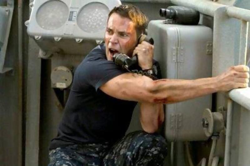 Taylor Kitsch as Lt Alex Hopper, a naval officer assigned to the USS John Paul Jones in a scene from the movie Battleship, opening in the UAE today.