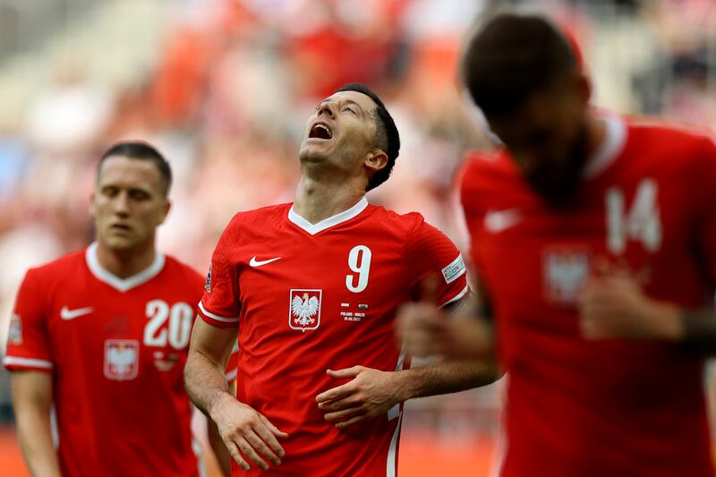 Poland's Robert Lewandowski reacts after a missed chance. AP