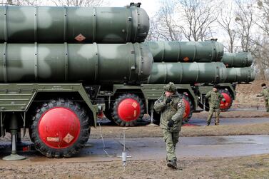 Russian servicemen stand next to a S-400 'surface-to-air missile system outside Gvardeysk near Kaliningrad, Russia March 11, 2019. Reuters