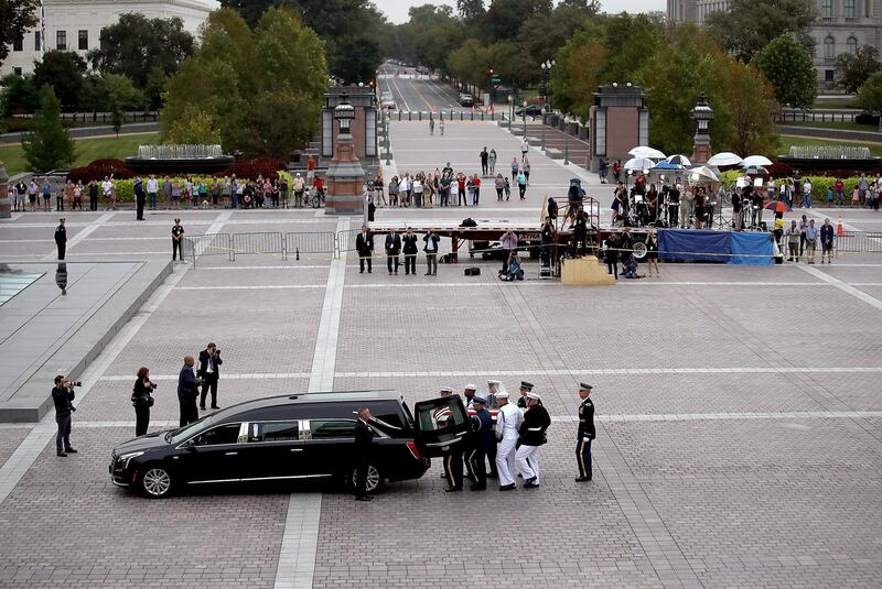 A military honour guard team places the casket of the late-Sen. John McCain (R-AZ) into a waiting hearse outside the US Capitol in Washington. Reuters