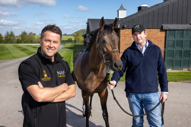 Michael Owen and trainer Hugo Palmer with their star colt Mr McCann at Manor House Stables. A syndicate of six Liverpool stars own Mr McCann. 