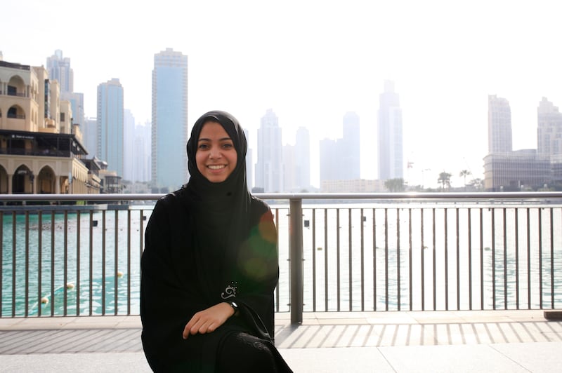 DUBAI, UAE. April 15, 2014 - Emirati university student Sara Al Boom is photographed beside Dubai Mall Fountain in Dubai, April 15, 2014. (Photos by: Sarah Dea/The National, Story by: Ramola Talwar, News)
