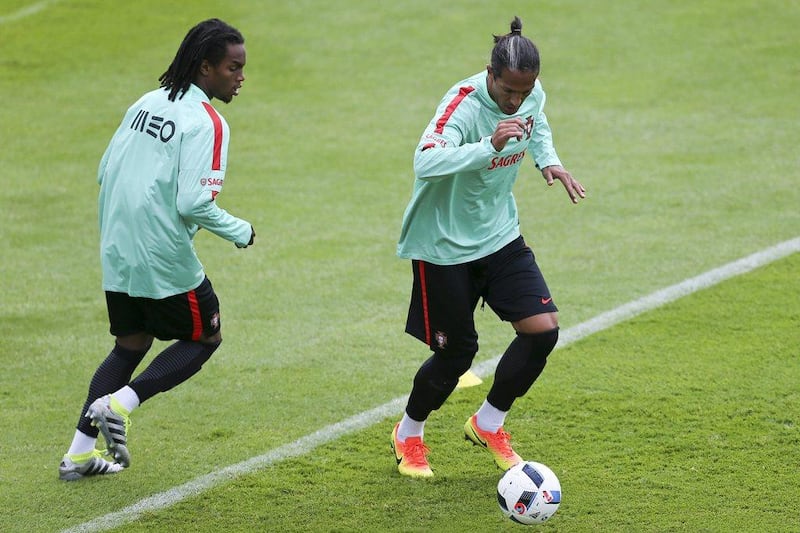 Portugal's national soccer team players Renato Sanches (L) and Bruno Alves (R) in actionduring the training session at at the team's training camp in Marcoussis, near Paris, France, 16 June 2016. EPA/MIGUEL A. LOPES