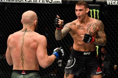 ABU DHABI, UNITED ARAB EMIRATES - JANUARY 23: (R-L) Dustin Poirier points at Conor McGregor of Ireland in a lightweight fight during the UFC 257 event inside Etihad Arena on UFC Fight Island on January 23, 2021 in Abu Dhabi, United Arab Emirates. (Photo by Jeff Bottari/Zuffa LLC)