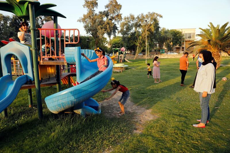 Iraqi children play at Abu Nawas park after restrictive measures were partially eased, in Baghdad, Iraq. Reuters