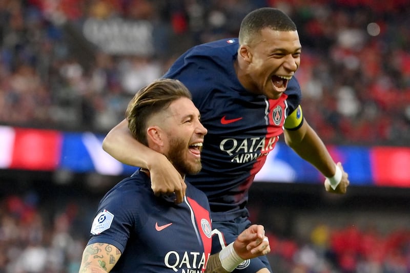 Sergio Ramos celebrates scoring with Kylian Mbappe. AFP