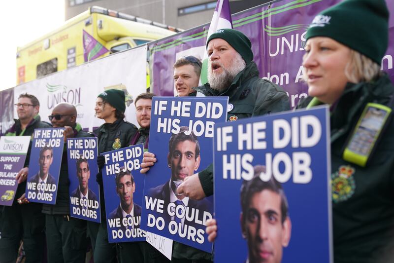 Ambulance workers on the picket line outside London Ambulance Service NHS Trust control room in Waterloo, London. PA