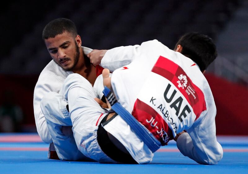 UAE fighters Khalid Iskander Al Balushi and Hamad Nawad compete in the men’s 56kg final. Issei Kato / Reuters