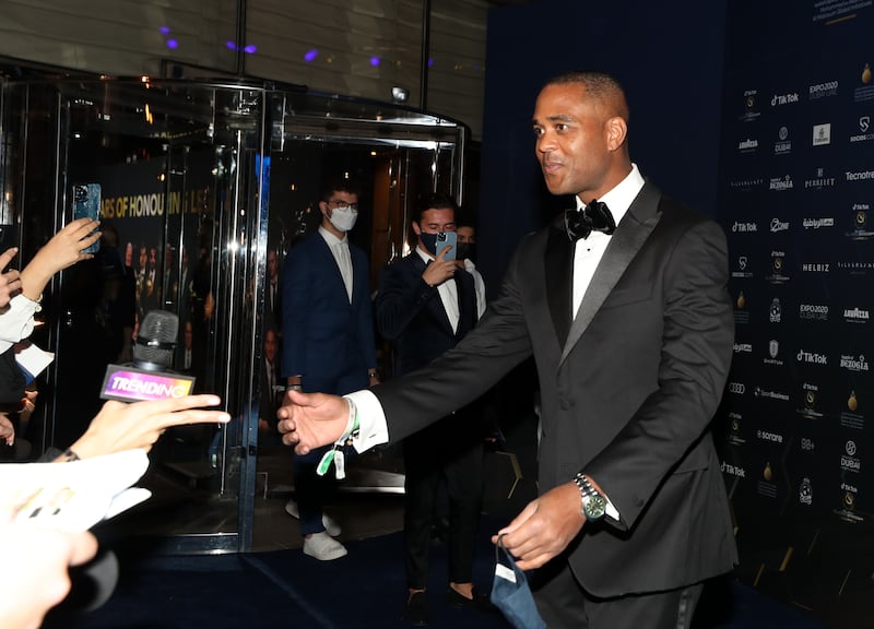 Former Netherlands and Barcelona player Patrick Kluivert arrives at the Globe Soccer Awards at the Armani Hotel.