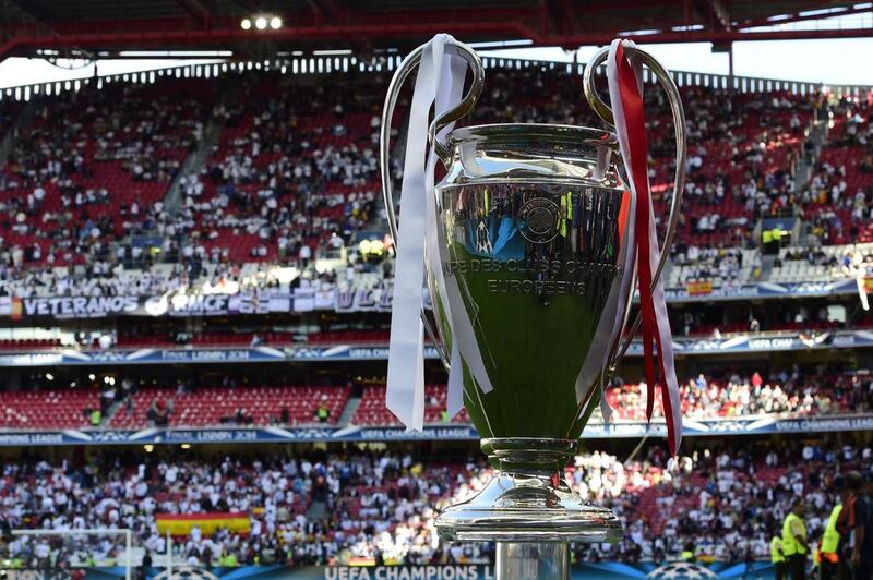 The Champions League trophy is put on display on the pitch prior to Champions League final between Real Madrid and Atletico Madrid on Saturday night. Javier Soriano / AFP / May 24, 2014