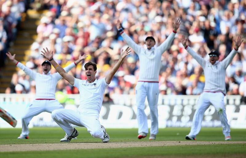 Steven Finn appeals unsuccessfully for the wicket of Mitchell Marsh. Michael Steele / Getty Images