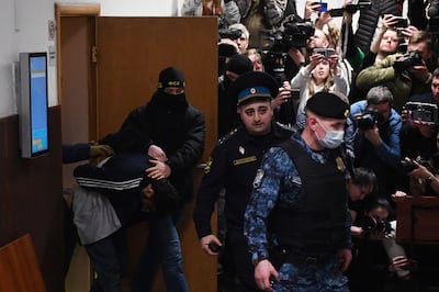 Four men have been remanded by a Moscow court on suspicion of carrying out the attack that killed 137 people. AFP 