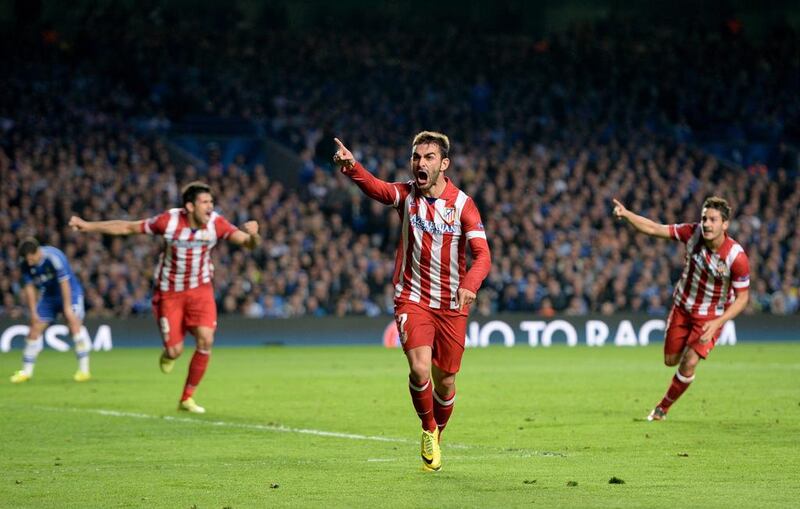 Atletico Madrid's Adrian Lopez, centre, celebrates scoring the equaliser during the Uefa Champions League semi-final second leg against Chelsea at Stamford Bridge in London on April 30, 2014. Andy Rain / EPA