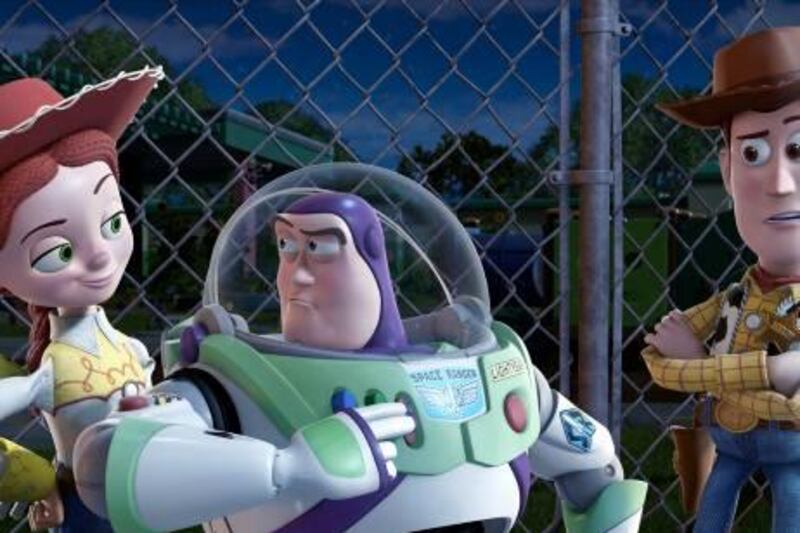 In this film publicity image released by Disney, from left, Jessie, voiced by Joan Cusack, Buzz Lightyear, voiced by Tim Allen and Woody, voiced by Tom Hanks are shown in a scene from "Toy Story 3."  (AP Photo/Disney Pixar) NO SALES *** Local Caption ***  NYET313_2010_International_Box_Office.jpg