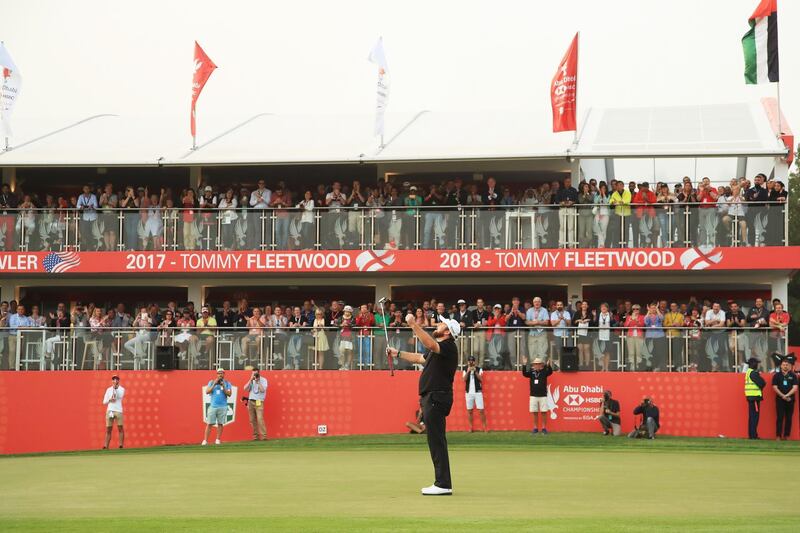 That winning feeling for Lowry as spectators watch on.