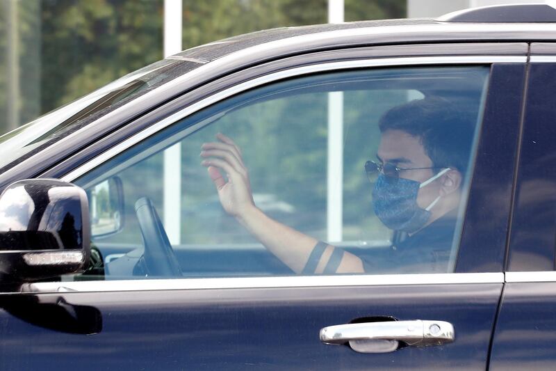 Juventus' Paulo Dybala is seen wearing a protective face mask as he arrives at Juventus Training Center. Reuters
