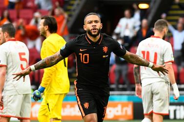 Soccer Football - Euro 2020 - Group C - North Macedonia v Netherlands - Johan Cruijff ArenA, Amsterdam, Netherlands - June 21, 2021 Netherlands' Memphis Depay celebrates scoring their first goal Pool via REUTERS/Piroschka Van De Wouw