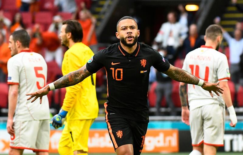 Soccer Football - Euro 2020 - Group C - North Macedonia v Netherlands - Johan Cruijff ArenA, Amsterdam, Netherlands - June 21, 2021 Netherlands' Memphis Depay celebrates scoring their first goal Pool via REUTERS/Piroschka Van De Wouw