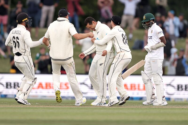 Ross Taylor is congratulated after his match-clinching wicket. AP