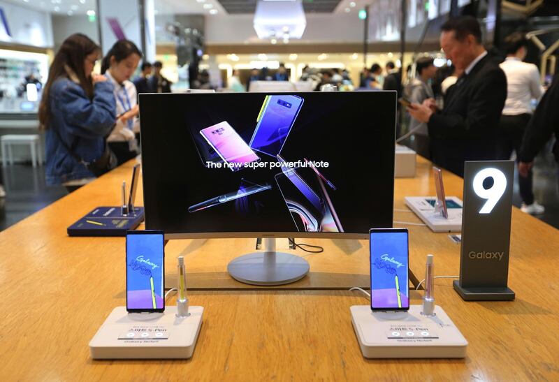 Samsung Electronics' Galaxy Note9 smartphones are displayed at its shop in Seoul, South Korea, Wednesday, Oct. 31, 2018. Samsung Electronics Co. has posted record operating profit for the last quarter with robust demand for its mainstay memory chips compensating for a slowdown in its smartphone business. (AP Photo/Ahn Young-joon)