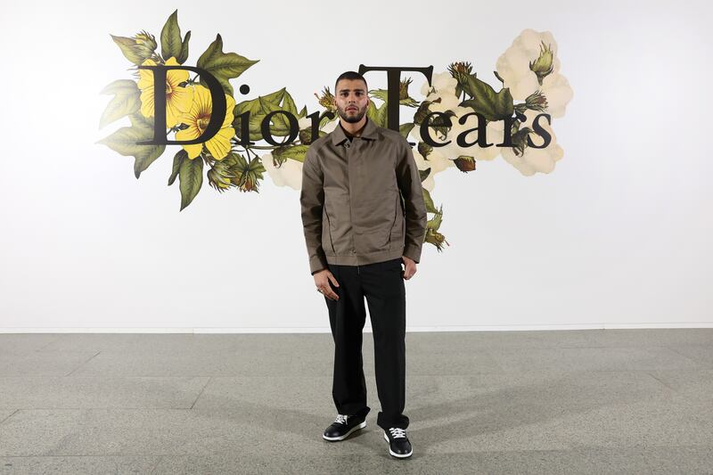 French-Algerian model and entrepreneur Younes Bendjima attends Dior x Denim Tears. Dior director Kim Jones unveiled two collections in Cairo this week