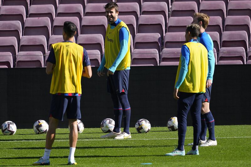 Gerard Pique trains after announcing his retirement. EPA