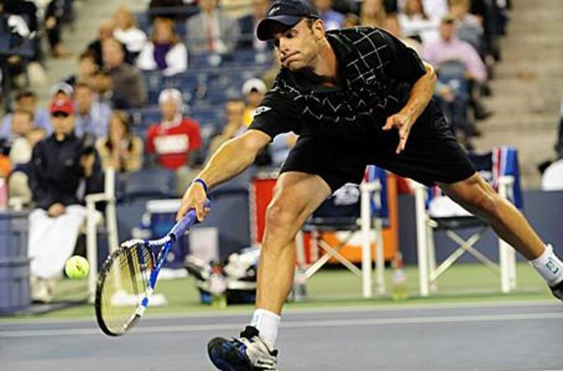 Andy Roddick at full stretch on his way to victory over Germany's bjorn Phau at the US Open.