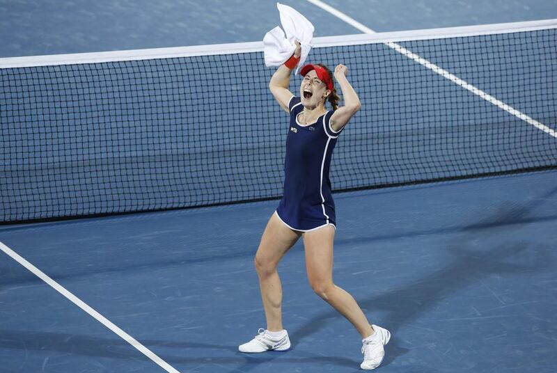 Alize Cornet of France celebrates after defeating Serena Williams of the USA in their women’s singles semi-final match at the Dubai Tennis Championships on February 21, 2014. Faisal Al Nasser / Reuters