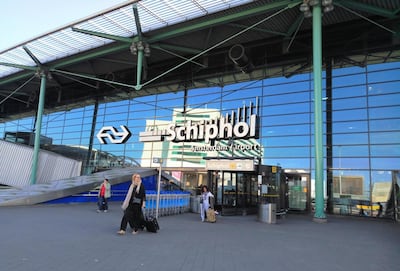 A man suspected to be part of a gang accused of orchestrating a string of killings was arrested at Amsterdam's Schiphol airport following his deportation from Dubai.