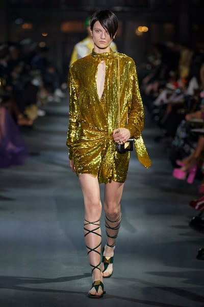 Roman sandals and toga-style dresses were part of the bright and optimistic collection. Photo: Valentino