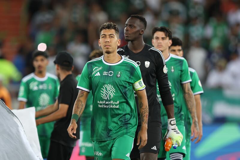 Captain Roberto Firmino leads out the Al Ahli team. Getty