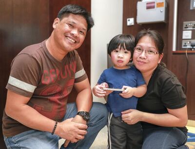 Abu Dhabi, August 11, 2018.  Operation Smile and Cleveland Clinic AUH team up to help children with cleft palate and cleft lip deformities.  Zack-2 and his parents, Ruel and Bernadette Guarino.
Victor Besa / The National
Section:  NA
Reporter:  Shireena Al Nowais