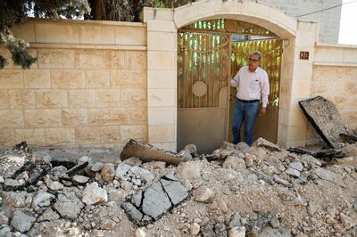 A Palestinian surveys the damage after an Israeli raid in Jenin camp in the occupied West Bank. Reuters