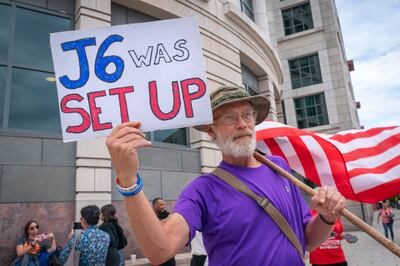 Jericho Steve, of Pennsylvania, a supporter of the January 6th defendants and Donald Trump, protests outside federal court, in Washington last week. AP