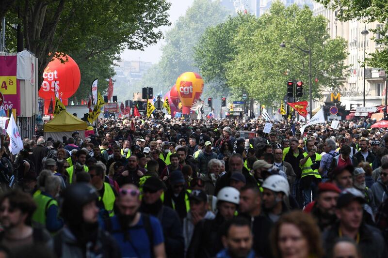 People take part in the annual May Day (Labour Day) workers' demonstration in the Montparnasse district of Paris on May 1, 2019.  AFP