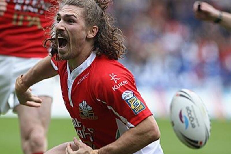 Jarrod Sammut celebrates after scoring a try yesterday in his first appearance for Crusaders.
