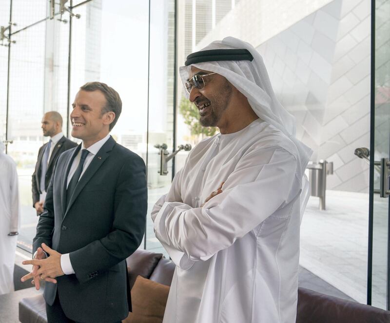 AL MARYAH ISLAND, ABU DHABI, UNITED ARAB EMIRATES - November 09, 2017: HH Sheikh Mohamed bin Zayed Al Nahyan, Crown Prince of Abu Dhabi and Deputy Supreme Commander of the UAE Armed Forces (R), meets with HE Emmanuel Macron, President of France (L), at Zuma restaurant. 
( Mohamed Al Hammadi / Crown Prince Court - Abu Dhabi )
---