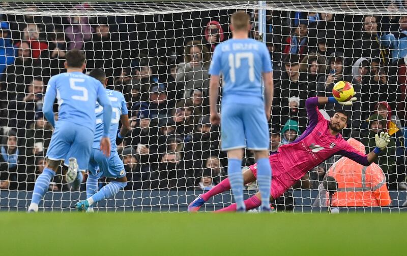 Manchester City's Riyad Mahrez scores past Fulham's goalkeeper Paulo Gazzaniga. AFP