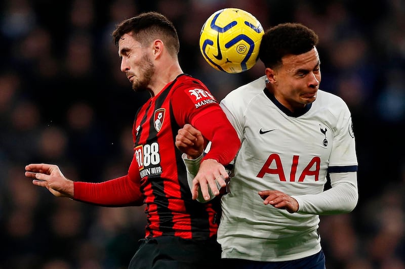 Bournemouth's English midfielder Lewis Cook (L) vies to header the ball with Tottenham Hotspur's English midfielder Dele Alli during the English Premier League football match between Tottenham Hotspur and Bournemouth at the Tottenham Hotspur Stadium in London, on November 30, 2019.  - RESTRICTED TO EDITORIAL USE. No use with unauthorized audio, video, data, fixture lists, club/league logos or 'live' services. Online in-match use limited to 120 images. An additional 40 images may be used in extra time. No video emulation. Social media in-match use limited to 120 images. An additional 40 images may be used in extra time. No use in betting publications, games or single club/league/player publications.
 / AFP / Adrian DENNIS / RESTRICTED TO EDITORIAL USE. No use with unauthorized audio, video, data, fixture lists, club/league logos or 'live' services. Online in-match use limited to 120 images. An additional 40 images may be used in extra time. No video emulation. Social media in-match use limited to 120 images. An additional 40 images may be used in extra time. No use in betting publications, games or single club/league/player publications.
